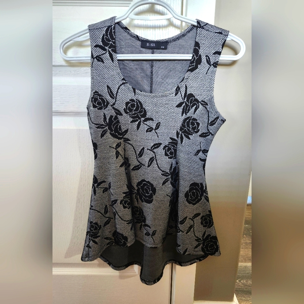Excellent condition peplum top. Size small. Final price  thx
